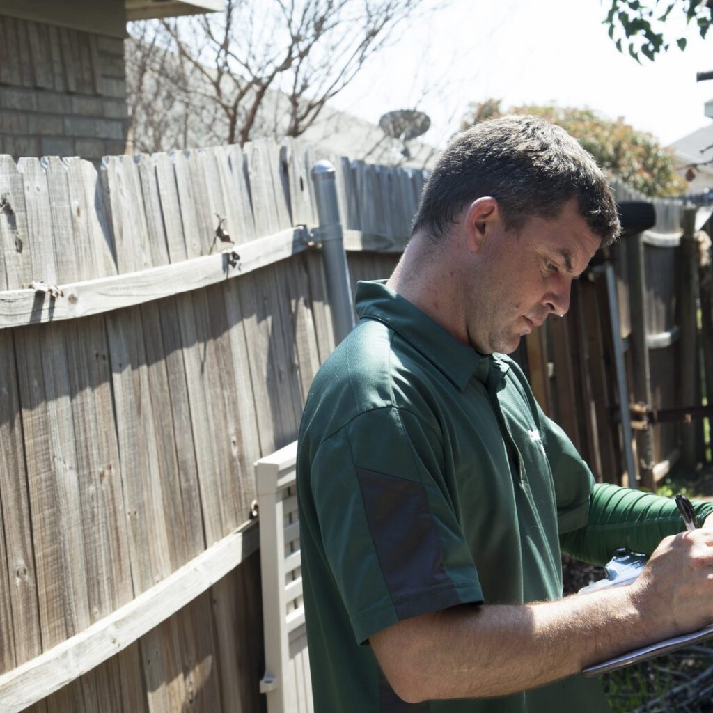 AC Genius HVAC technician repairing a unit at a Crowley, TX home